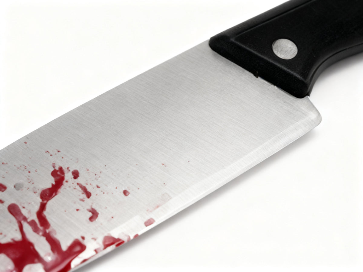 Daga de plástico con sangre para Halloween 1pc