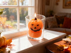 Vela de Calabaza Sonriente en Vaso